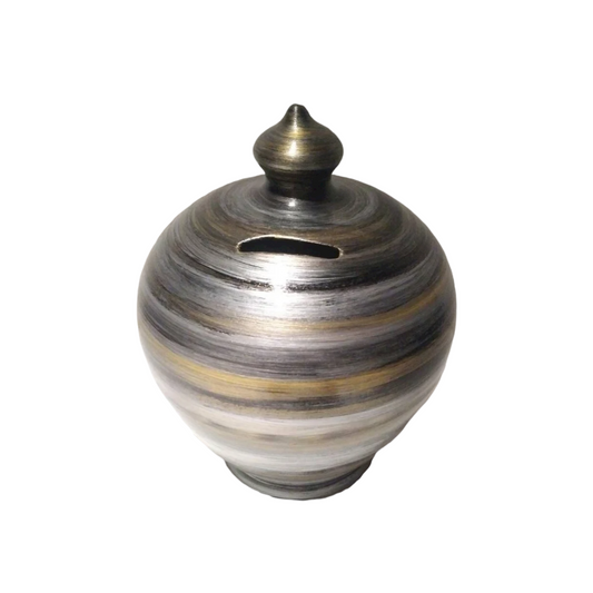 Pottery piggy bank. handmade and handpainted with swirls in black, silver and gold. Size: 15 cm = 5.90 inches in height. Circumference: 40 cm = 15.74 inches. Colors: Silver, Gold and Black. With hole and stopper plug, or without hole.