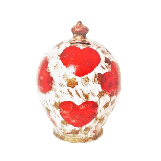A piggy bank full of hearts for enjoying some lovely savings! Handmade and hand painted in Italy.  Size: 17 cm = 6.70 inches in height. Circumference: 44 cm = 17.32 inches. Made to order, as in picture.@copyright registered. Colors: white, gold, red hearts. With hole and stopper plug, or without hole.